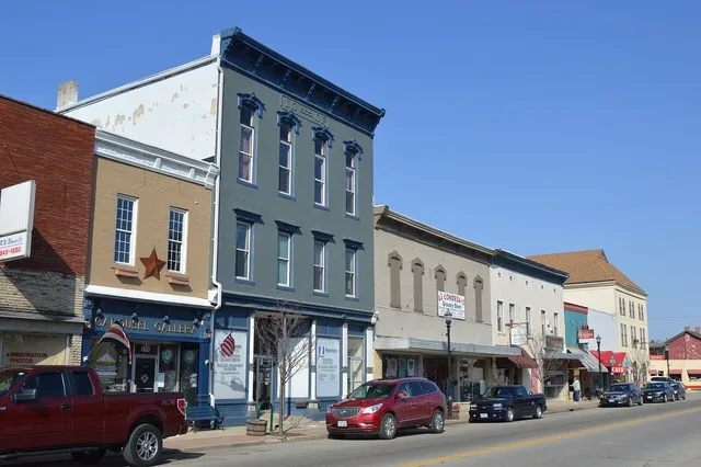 Buildings on the western side of the 100 block of S. Main Street ( State Route 235 ) in New Carlisle , Ohio , United States .