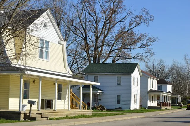 Houses on the eastern side of Washington Street ( State Route 320 ) south of Wrenn Avenue in New Paris , Ohio , United States .