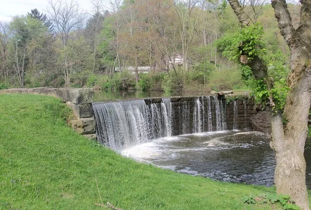 This dam across Bull Creek in New Waterford, Ohio impounds a pond in the village park.