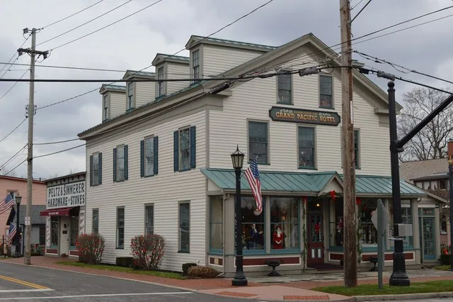 Front and southern side of the Grand Pacific Hotel , located at 8112 Columbia Road ( State Route 252 ) in Olmsted Falls , Ohio , United States . Built in 1855, it is listed on the...