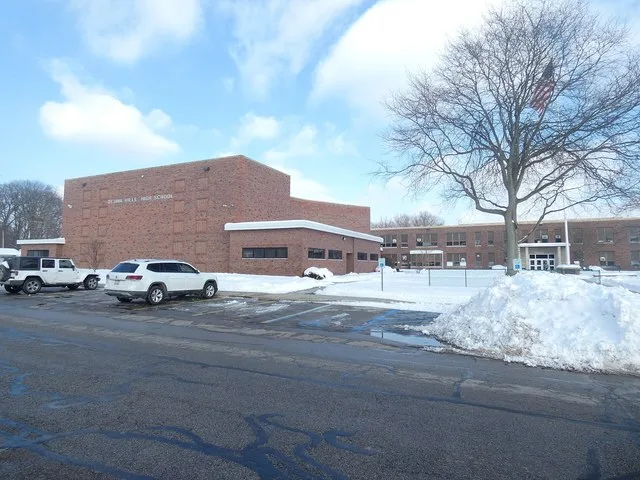 Photo showing a side entrance with the school's name at 2532 Evergreen Rd, Ottawa Hills, Ohio.
