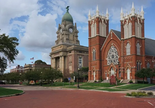 North Park Place in Painesville , Ohio . From left to right is the Methodist Episcopal Church of Painesville and the Lake County Courthouse . Within the Downtown Painesville Histo...