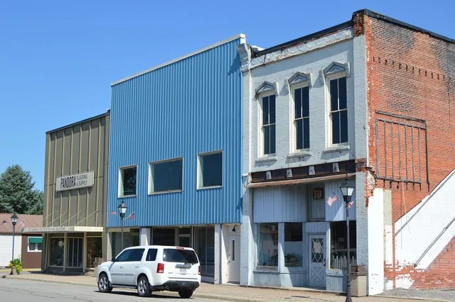 Buildings on the northern side of Main Street just east of the Jefferson Street intersection in Pandora , Ohio , United States .