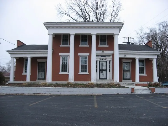 Front of the Robert W. Henry House in central Parma Heights , Ohio , United States . Located at 6607 Pearl Road ( U.S. Route 42 ), the property (now American Eagle Realty) is list...
