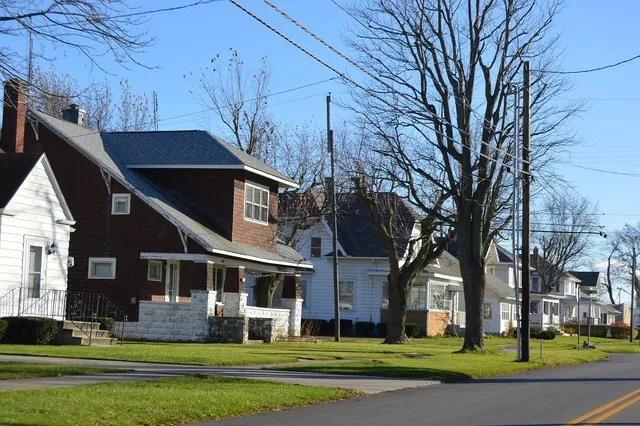 Houses on the eastern side of Main Street ( State Route 49 ) north of Elm Street in Payne , Ohio , United States .