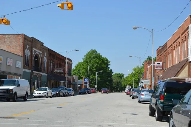 Looking west on Front Street ( State Route 105 ) from Water Street in central Pemberville , Ohio , United States .