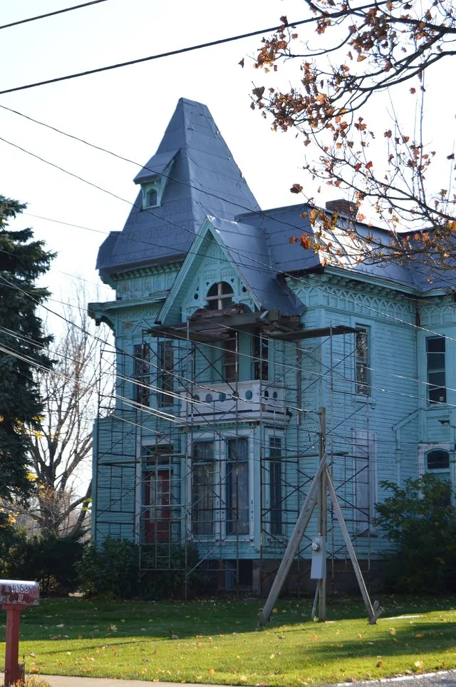 Front of the Lucius Green House , located at 4160 Main Street in Perry , Ohio , United States . Built in 1880, it is listed on the National Register of Historic Places .