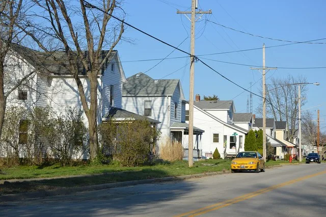 Houses on the northern side of Main Street, east of the Cherry Street intersection, in Phillipsburg , Ohio , United States .