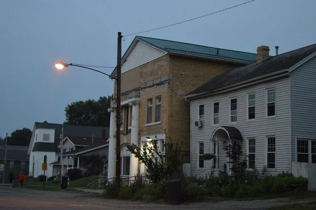 Buildings on Main Street west of the Mill Street intersection in Pleasant City , Ohio , United States .