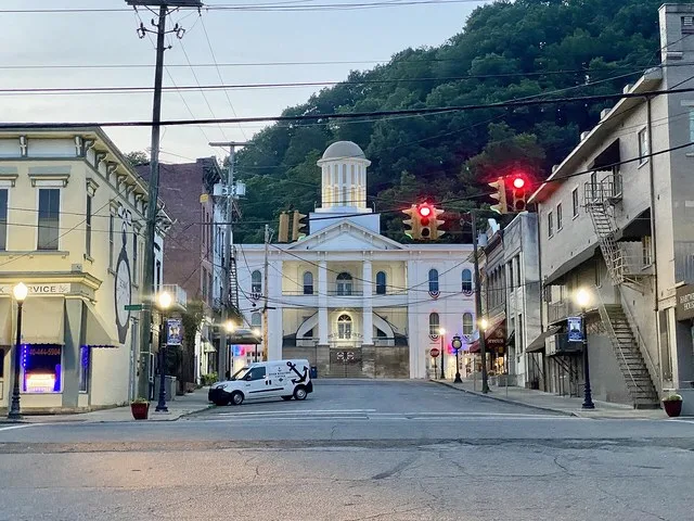 Built in the late 19th Century and early 20th Century, these buildings represent the Italianate, Queen Anne, and Classical Revival styles, and feature brick exteriors and first-fl...