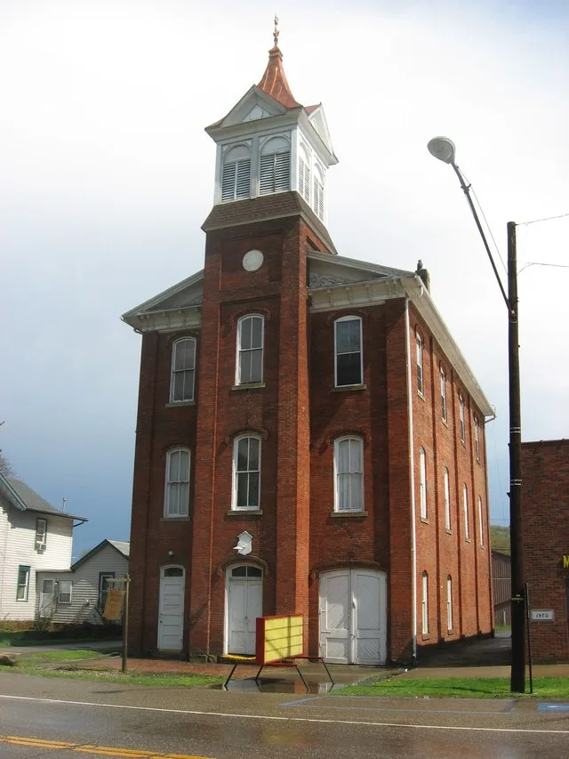 Front and western side of the Port Washington Town Hall , located on Main Street ( U.S. Route 36 ) in downtown Port Washington , Ohio , United States . Built in 1878, it is listed...