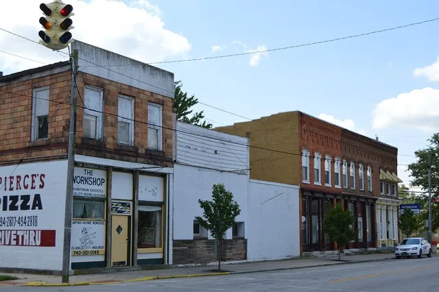 Buildings on the southern side of Water Street ( State Route 47 ) just west of the Elm Street intersection in central Prospect , Ohio , United States .