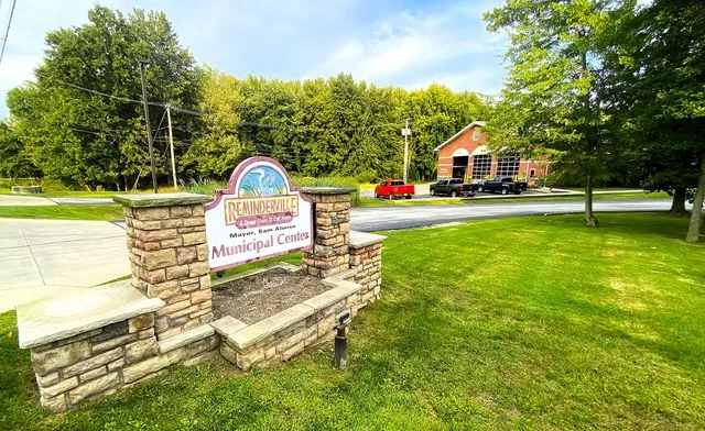 Sign for the Municipal Center with the Fire Station in the background.
