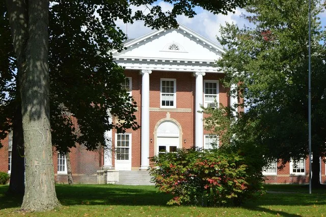 Front of the Rock Creek School , located at 2987 High Street in Rock Creek , Ohio , United States . Built in 1869, it is listed on the National Register of Historic Places .