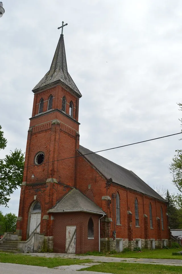 Front and western side of the former St. John's Lutheran Church, located at 14532 Second Street in Rocky Ridge , Ohio , United States . It was built in 1889, and the church's near...
