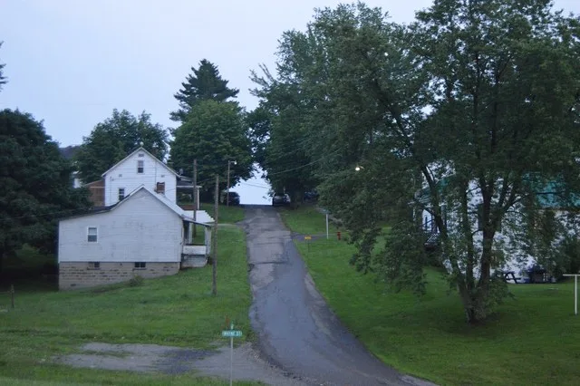 Looking southward along Main Street from State Routes 146 / 147 in Sarahsville , Ohio , United States .