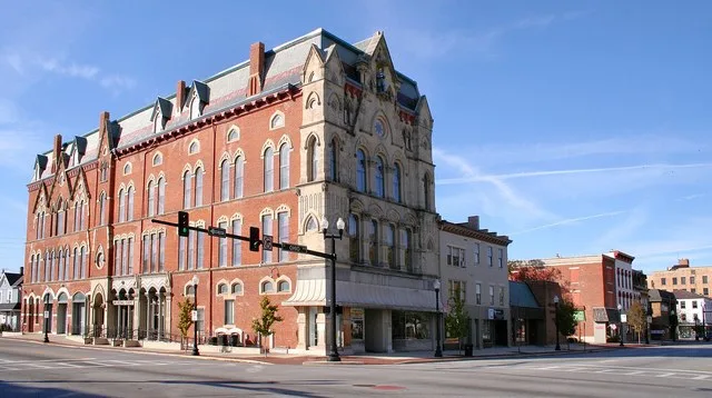 Downtown Sidney, Ohio . The municipal courts are housed in the Gothic revival 1877 Monumental Building dedicated to the county's Civil War dead. This is an image of a place or bui...