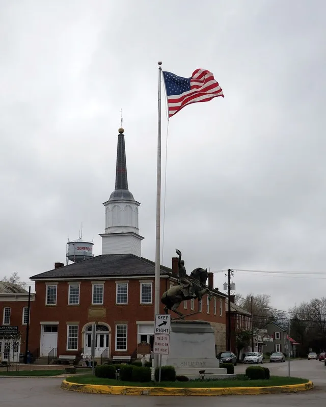 Old Perry County Courthouse with Sheridan Monument and water tower (Somerset, Ohio)