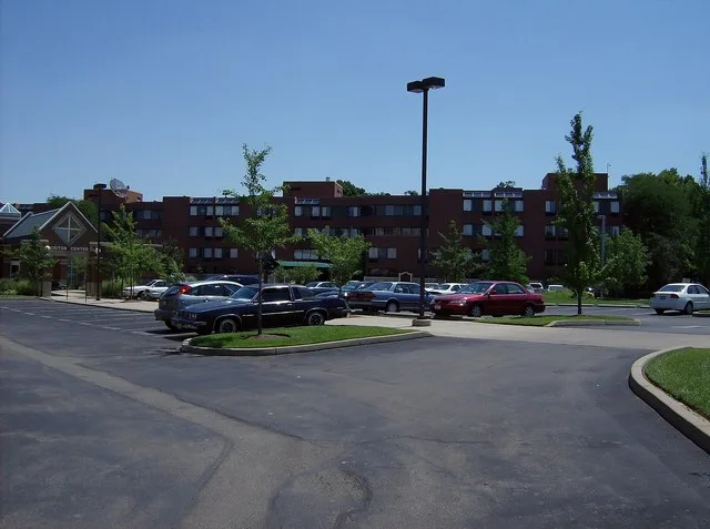 Parking lots at the center of Maple Knoll Village in Springdale, Ohio , Ohio , United States . Picture taken at Breeze Manor, looking toward the visitors' entrance and Beecher Pla...