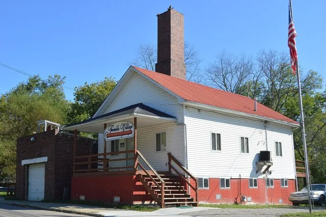 Front and western side of the Trimble village hall, located at 19549 Congress Street ( State Route 329 ) in Trimble , Ohio , United States .