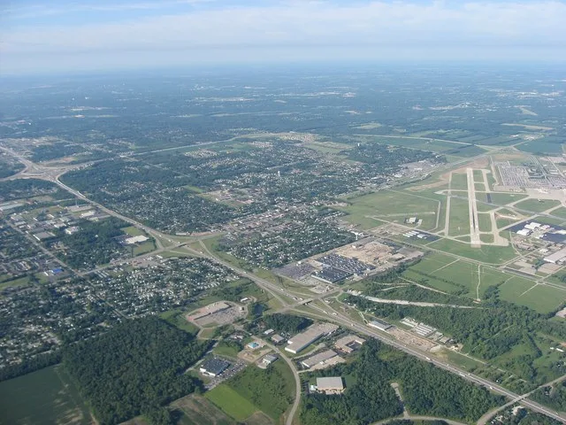 Aerial view of Vandalia , a city in Montgomery County , Ohio , United States , with the Dayton International Airport visible to the right. Interstate 75 is visible as the major hi...