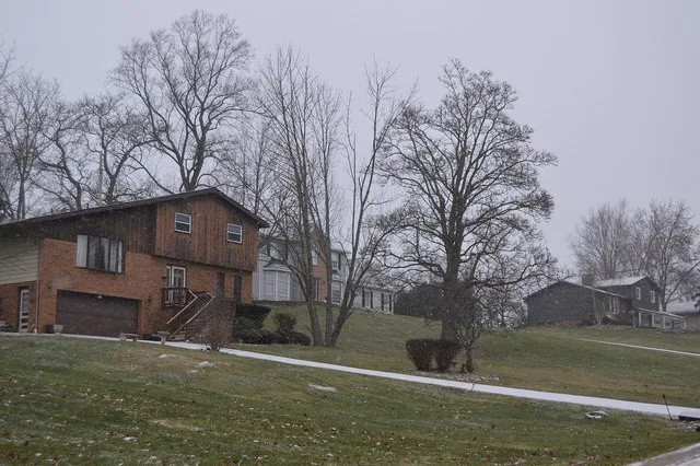 Houses on the western side of Meadowpark Drive, north of Alexander Road, in Walton Hills , Ohio , United States .