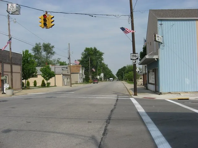 Eastward along the concurrent State Routes 67 and 196 at the central intersection of Waynesfield , Ohio , United States .
