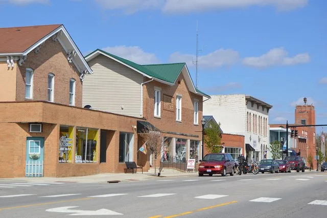 Buildings on the northern side of the first block of W. Main Street ( U.S. Route 40 ) in West Jefferson , Ohio , United States .