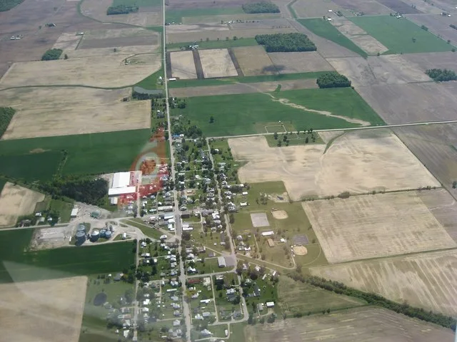 Aerial view of Wharton , a village in Wyandot County , Ohio , United States . Picture taken from a Diamond Eclipse light airplane at an altitude of 3,500 feet MSL and a bearing of...