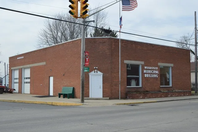 Front and southern side of the Woodstock village hall and fire station, located on the northwestern corner of the junction of Main ( State Route 559 ) and Bennett Streets in Woods...