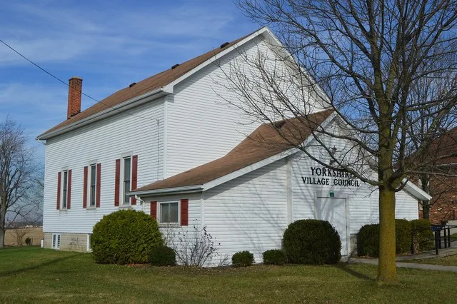 Front and western side of the Yorkshire village hall (formerly a Methodist church), located at 116 W. North Star Fort Loramie Road in Yorkshire , Ohio , United States .