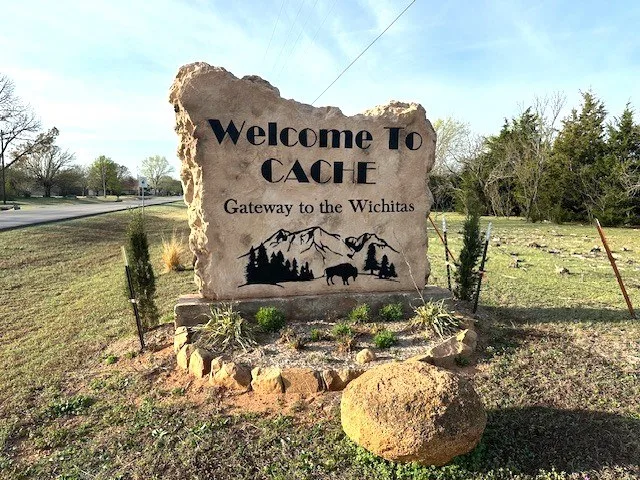 Welcome sign at Cache OK in 3-2025