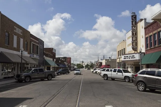 Downtown El Reno Oklahoma on 5-31-2014. This is looking south on S. Bickford Avenue between E. Woodson Street and Sunset Drive/Russell Street. The track in the street is used by t...