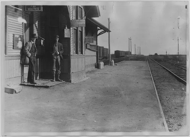 Scope and content: "---for whites" and "---for Negroes" signs partly visible.