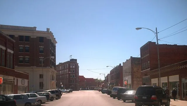Looking south down KiHeKah Ave. towards the Triangle Building in the Central business district of Pawhuska .