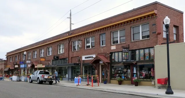 The historic Edward Earl Fisher Building (built 1916), located at 12444–12576 Southwest Broadway Street in Beaverton , Oregon , United States , is listed as a contributing resourc...