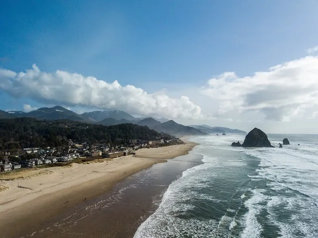 Aerial photograph of Haystack Rock in Cannon Beach, Oregon .