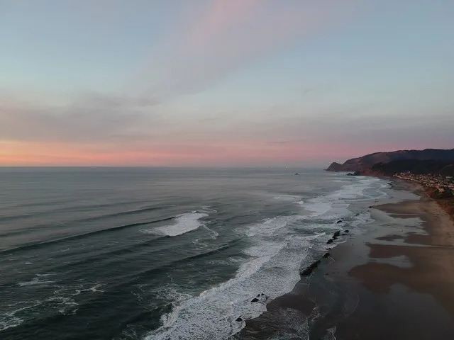 Represents the part of the Lincoln City, Oregon coastline looking North towards the previous community of Roads End.