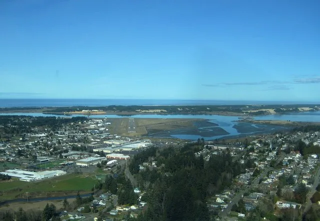 An aerial view of Coos Bay (the mouth of the Coos River) and North Bend, Oregon