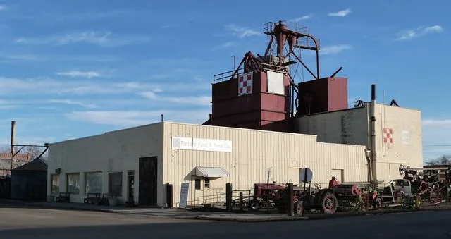 The historic Al Thompson & Son's Feed & Seed Company building (built 1938) — located at 117 Good Avenue in Nyssa , Oregon , United States. It currently houses the Oregon Trail Agr...