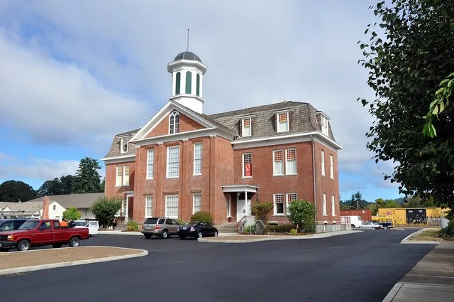 Benton County Historical Museum in Philomath, in the U.S. state of Oregon. View is to the northwest from an adjacent property near U.S. Route 20.