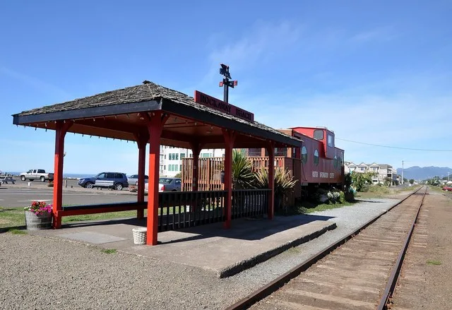 Visitor information center at Rockaway Beach, Oregon, in the United States. The building, a railroad caboose, is just off U.S. Highway 101 in the middle of town.