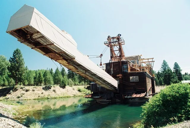Gold Dredge in Sumpter, OR and they thought that environmental damage would fix itself. The valley that Sumpter rules over is a barren, craggy maze of tailings. THis thing went al...