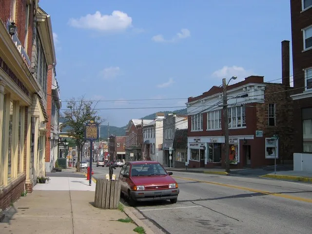 East Pitt Street in Bedford, Pennsylvania, looking west. At left is the historic Espy House. Near center on the far side of the street is the Pitt Theater, the only cinema in Bedf...