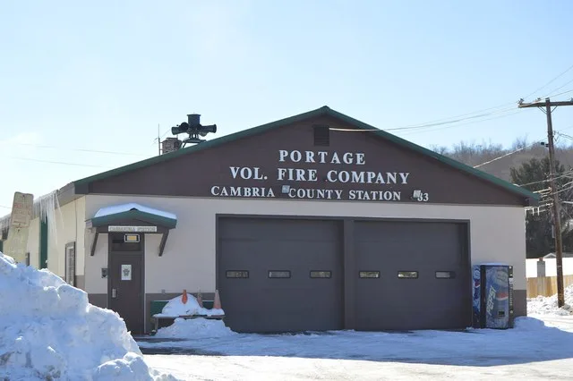 Front and eastern side of the Portage Volunteer Fire Company fire hall, located on Main Street in Cassandra , Pennsylvania , United States .