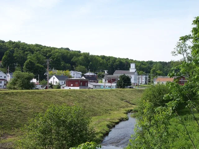 Description: Picture is of Cherry Tree taken along Cush Cushion Creek and the flood control levee. Visible in the picture is Front Street and the Presbyterian church. Author: Pict...