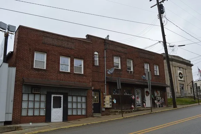 Buildings on the western side of the 100 block of N. Main Street ( Pennsylvania Route 68 ) in Chicora , Pennsylvania , United States .