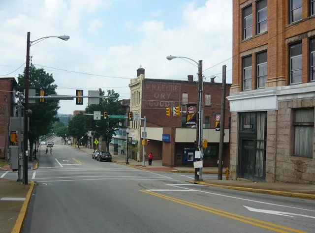 Business district of Connellsville, Pennsylvania. Photo was taken looking downhill (westward) on East Crawford Avenue, traditionally the main shopping street of the city. The next...