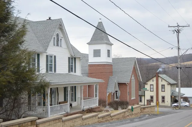 Houses and the Methodist church located on the northern side of Washington Street at the Second Street intersection in Dudley , Pennsylvania , United States .