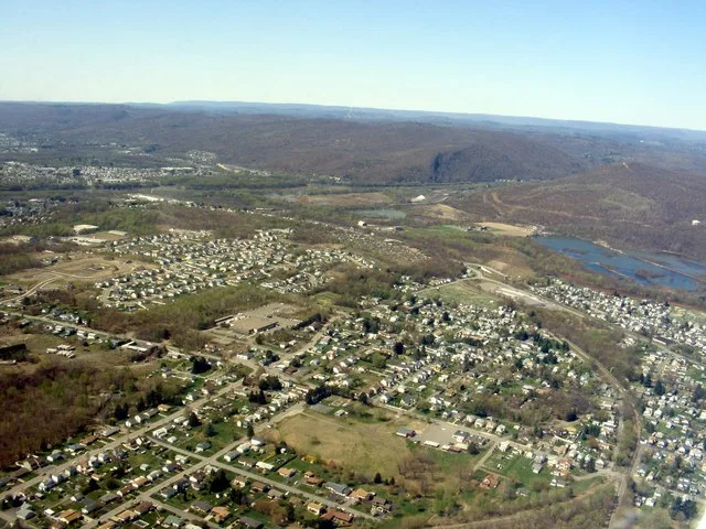 Aerial view of Duryea looking southwest. Susquehanna River, West Pittston can be seen in the background.